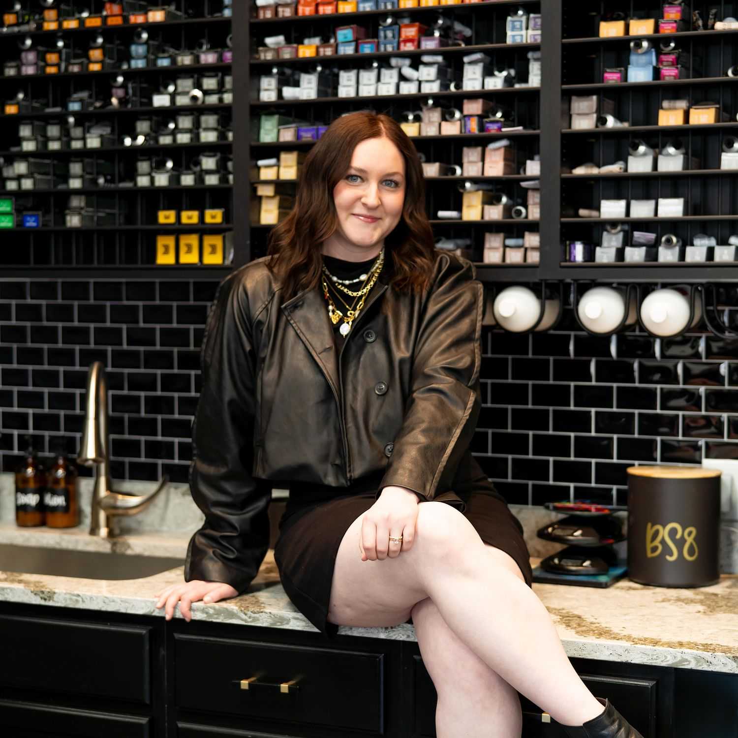 Portrait of Sophie, a professional stylist at Elevate Hair Studio by Tricia Cosgrove, showcasing their expertise and style.